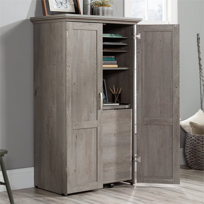 Carell Furniture Engineered Wood Storage Craft Armoire in Mystic Oak