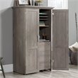 Carell Furniture Engineered Wood Storage Craft Armoire in Mystic Oak