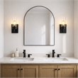 Scarten Modern Single-Light Wall Sconce with Black Metal and Clear Glass