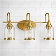 Vanity Gold Metal Glow Vanity Light Fixture with Three Clear Glass Shades