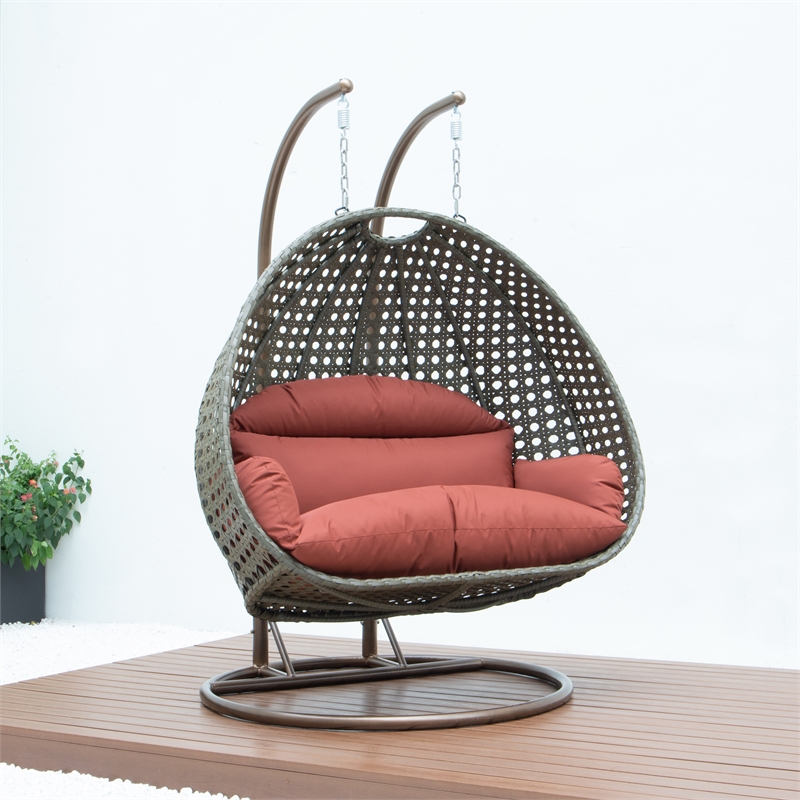 LeisureMod Outdoor Beige Wicker Hanging Double Egg Swing Chair in Dark Orange