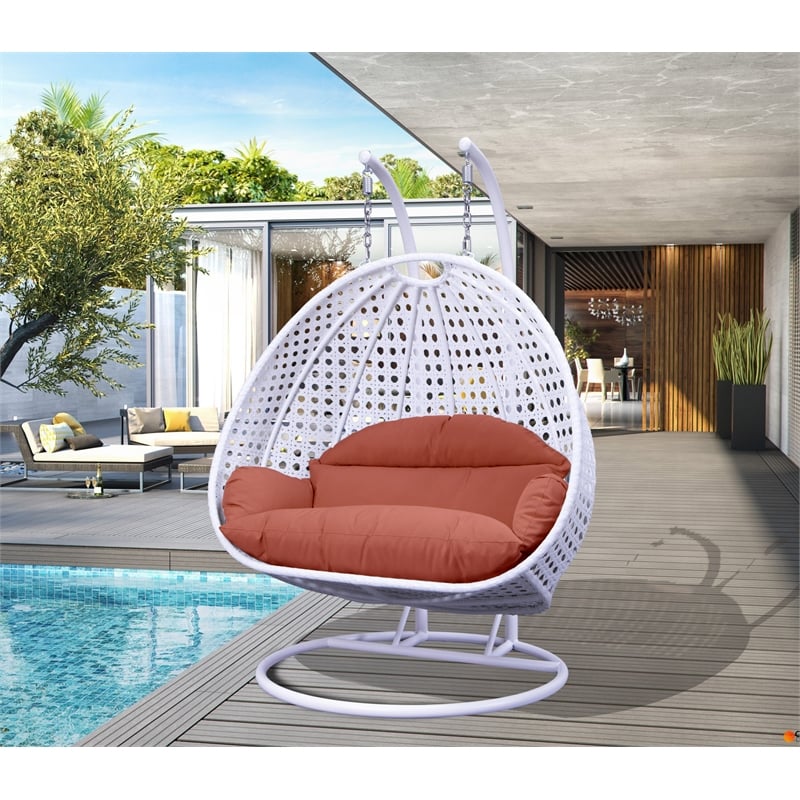 LeisureMod Outdoor White Wicker Hanging Double Egg Swing Chair in Dark Orange