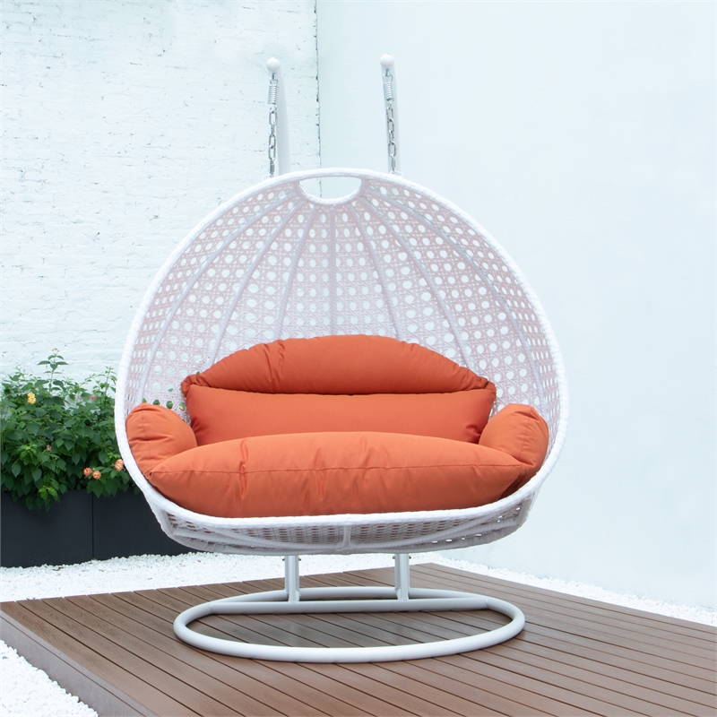 LeisureMod Outdoor White Wicker Hanging Double Egg Swing Chair in Orange