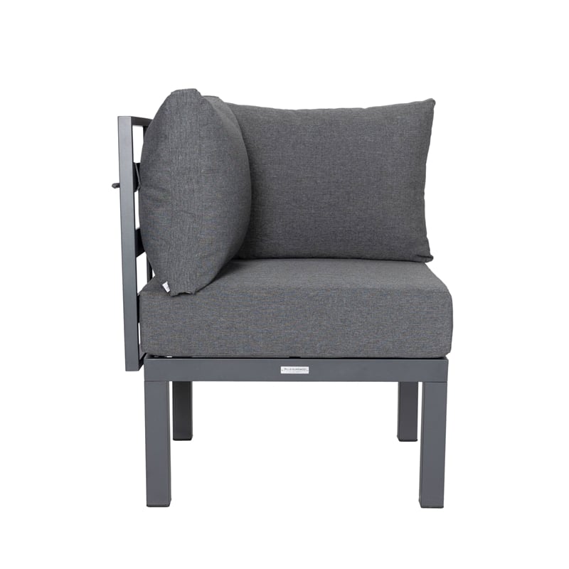 LeisureMod Chelsea 7-Piece Sectional And Fire Pit Table With Cushions in Black