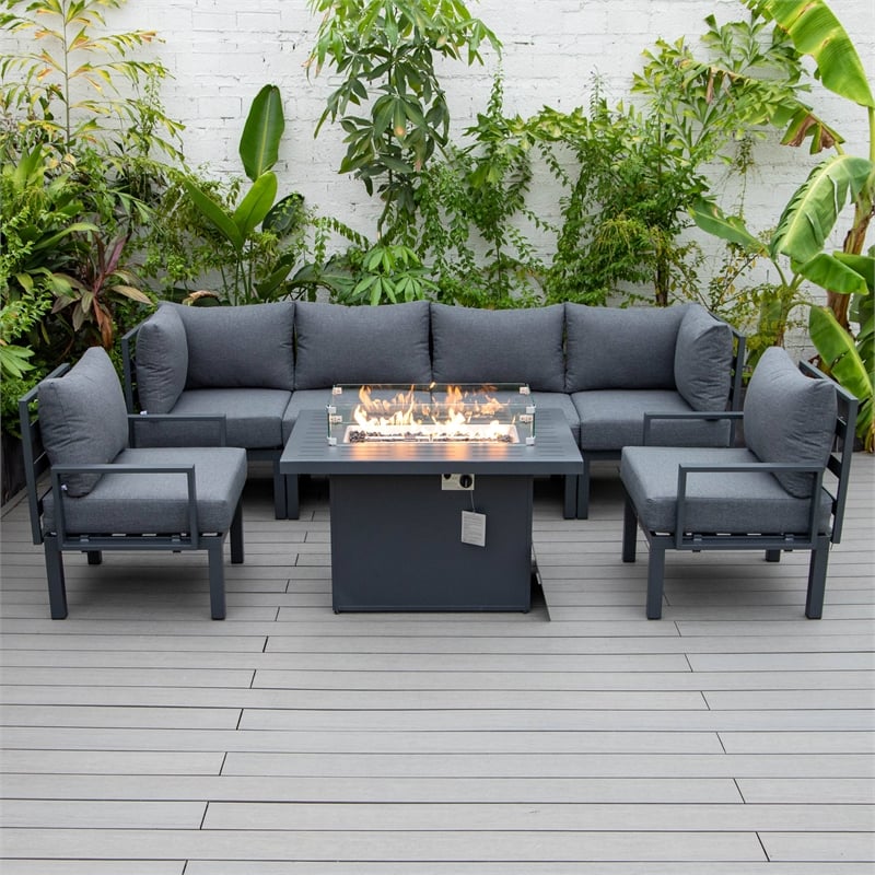 LeisureMod Chelsea 7-Piece Sectional And Fire Pit Table With Cushions in Black