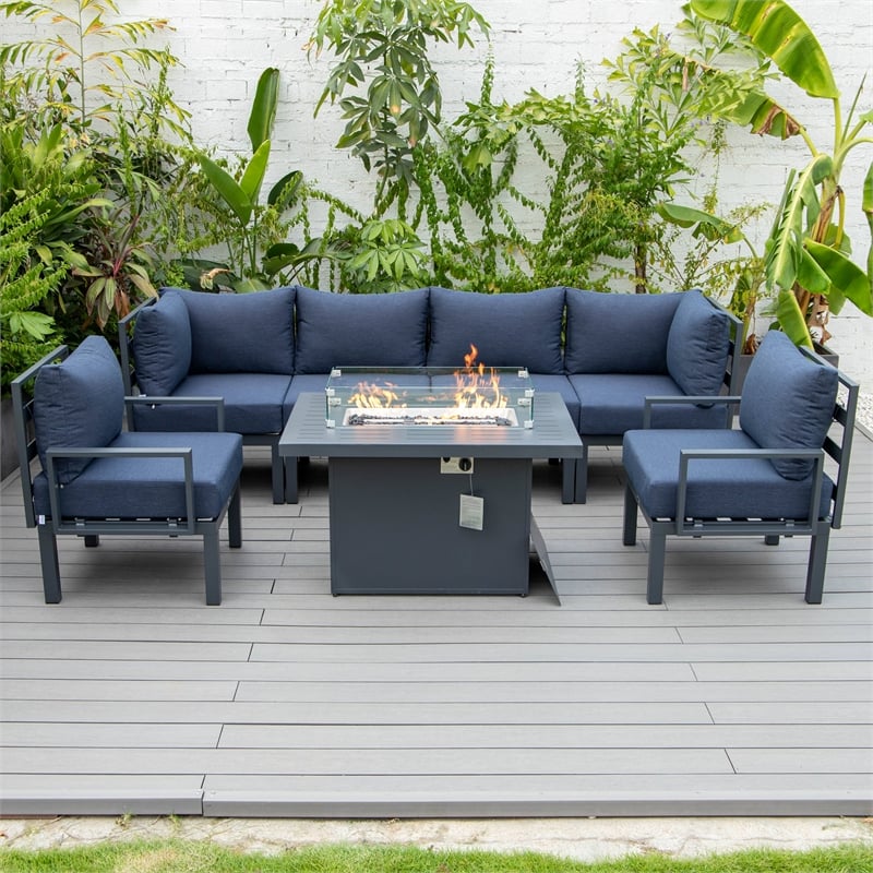 LeisureMod Chelsea 7-Piece Sectional And Fire Pit Table With Cushions in Blue