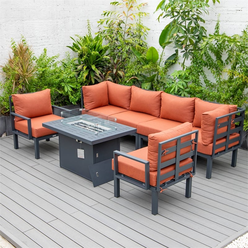 LeisureMod Chelsea 7-Piece Sectional And Fire Pit Table With Cushions in Orange