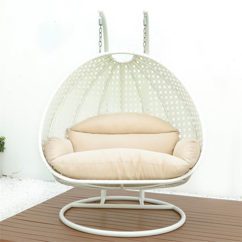 LeisureMod Outdoor White Wicker Hanging Double Egg Swing Chair in Beige