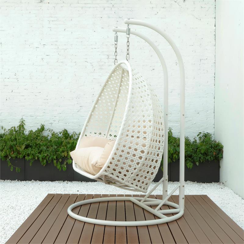 LeisureMod Outdoor White Wicker Hanging Double Egg Swing Chair in Beige