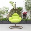 LeisureMod Beige Wicker Patio Egg Swing Chair with Stand in Light Green