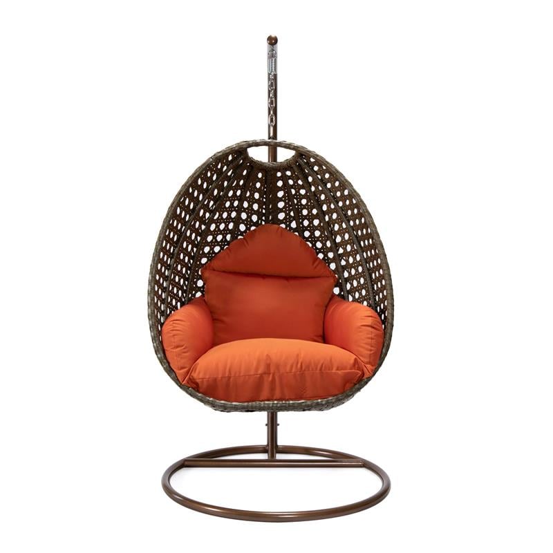 LeisureMod Beige Wicker Patio Egg Swing Chair with Stand in Orange