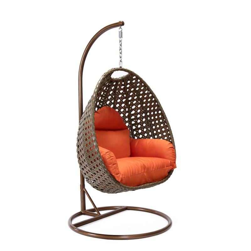 LeisureMod Beige Wicker Patio Egg Swing Chair with Stand in Orange