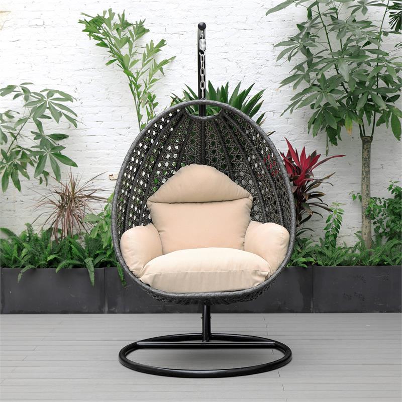 LeisureMod Charcoal Wicker Patio Egg Swing Chair with Stand in Beige