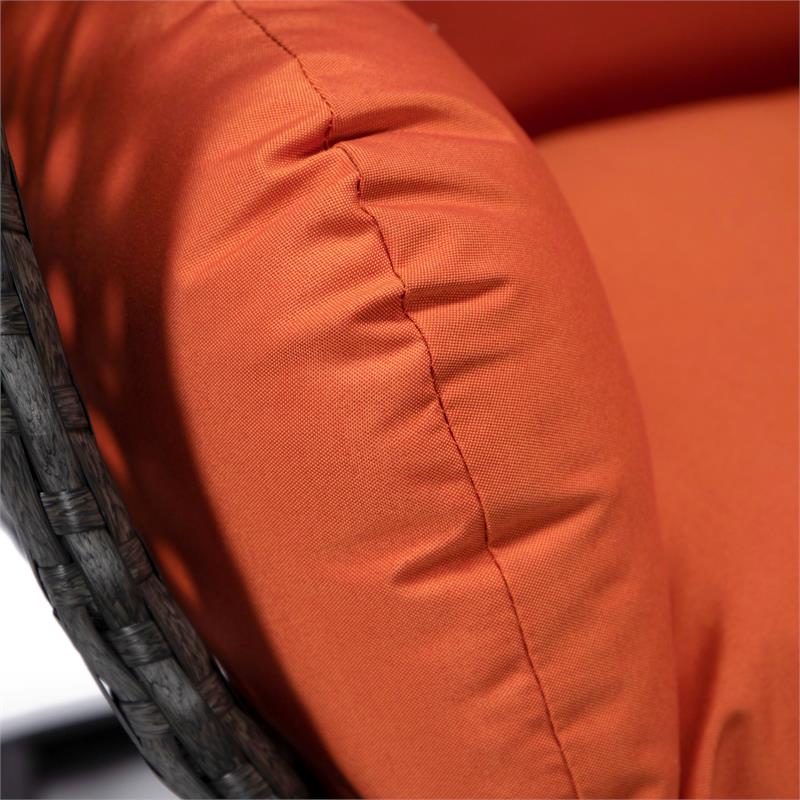 LeisureMod Charcoal Wicker Patio Egg Swing Chair with Stand in Orange