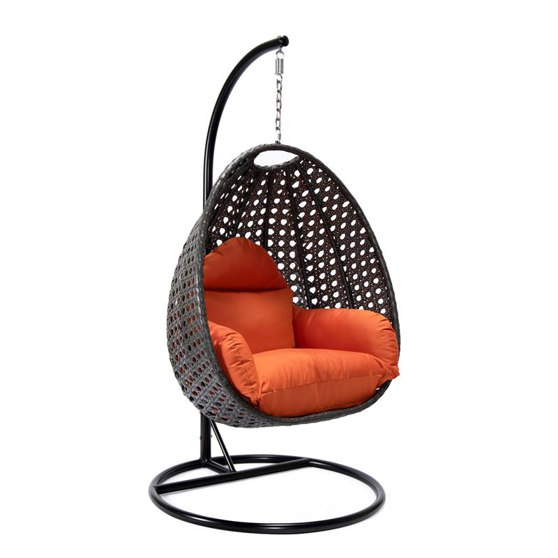LeisureMod Charcoal Wicker Patio Egg Swing Chair with Stand in Orange