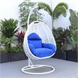LeisureMod White Wicker Patio Egg Swing Chair with Stand in Blue