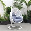 LeisureMod White Wicker Patio Egg Swing Chair with Stand in Charcoal Blue