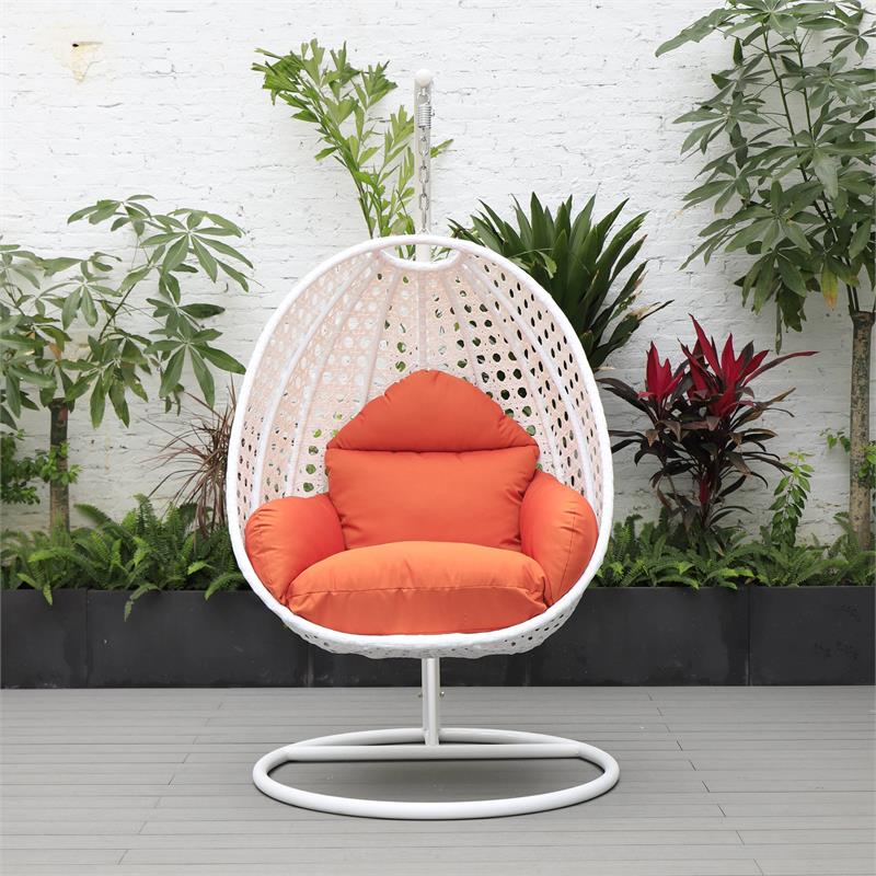 LeisureMod White Wicker Patio Egg Swing Chair with Stand in Orange