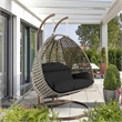 LeisureMod Outdoor Beige Wicker Hanging Double Egg Swing Chair in Black