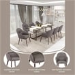 Elias Dining Chair Upholstered in Leather and Powder Coated Legs in Dark Gray