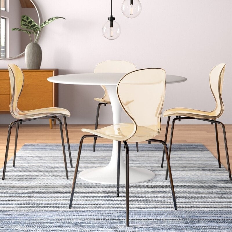 Transparent Plastic Side Chair with Black Metal Base in Amber