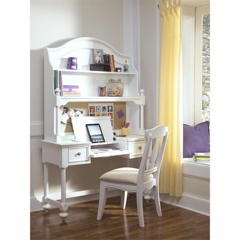 white desk with hutch and cork board