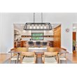 Living District Resolute 5-Light Mid-Century Metal Pendant in Brass and Black
