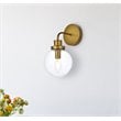Living District Hanson 1-Light Metal Bath Sconce in Brass and Clear