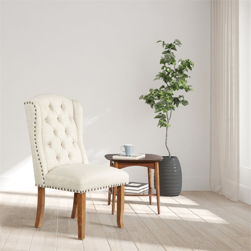 OSP Home Furnishings Jessica Tufted Wing Chair in Linen Cream Fabric
