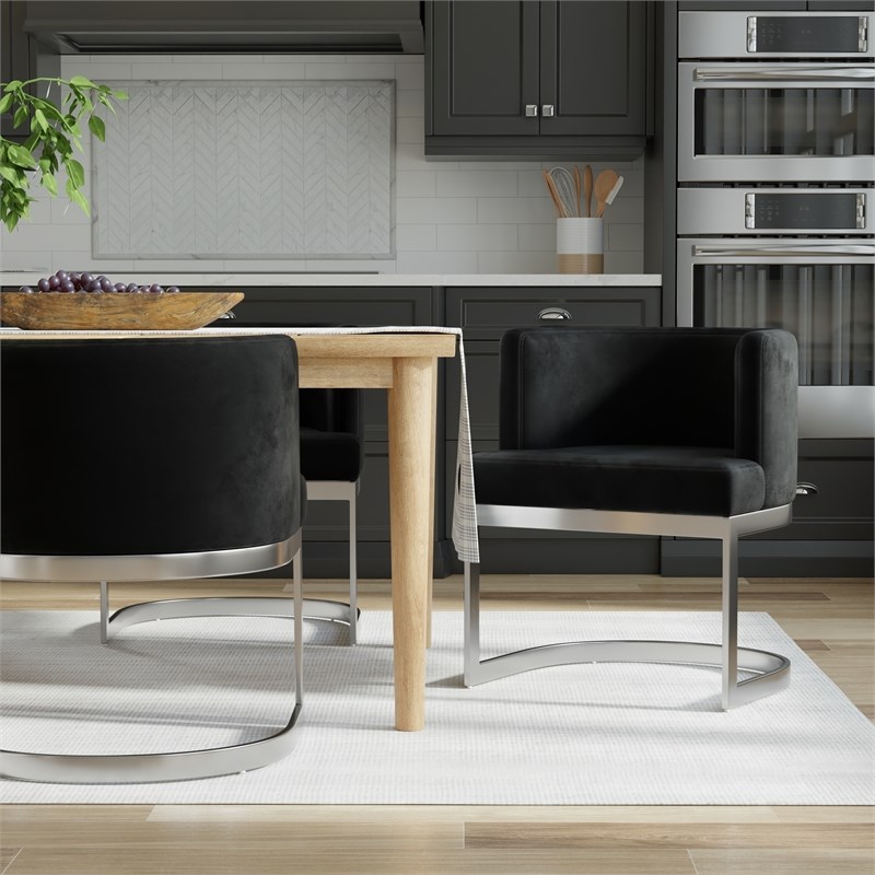 Wingback Dining chair in black fabric seat stainless steel base