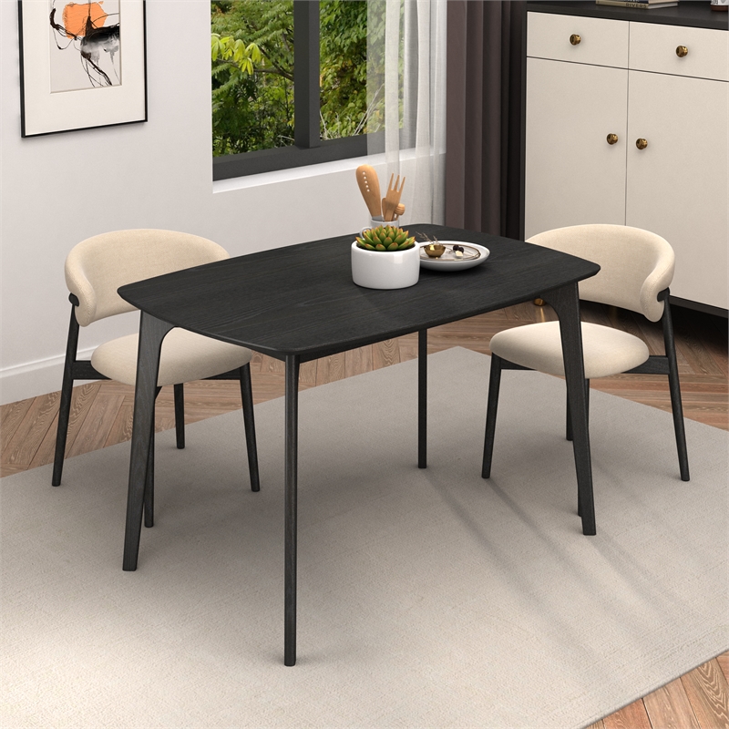 CRO Decor black plywood dining table with curved corners and wood grain desktop