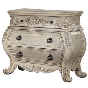 three drawer wooden nightstand with scrolled feet in antique white