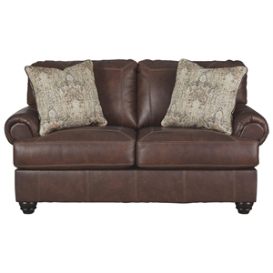 leatherette loveseat with rolled armrests and stitched details brown