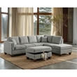 Essa Grey Reversible Sectional With USB Power Wood Legs And Storage Ottoman