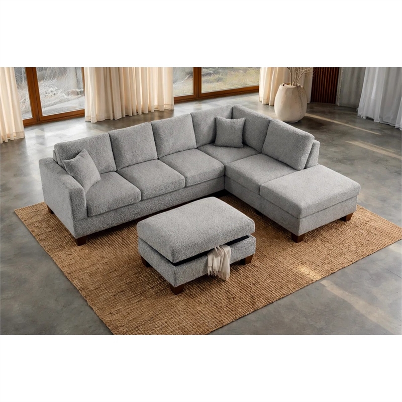 Essa Grey Reversible Sectional With USB Power Wood Legs And Storage Ottoman