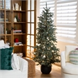 Nearly Natural 6ft Pre-Lit Pine Christmas Tree in Round Black Planter