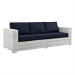 Afuera Living Fabric and Rattan Patio Sofa in Light Gray with Navy Cushions