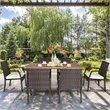 Costway 7-piece Rattan and Steel Patio Dining Set with Umbrella Hole in Brown