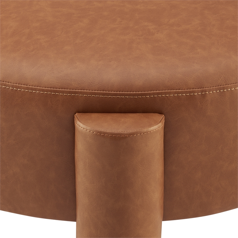 New Pacific Direct Elora Faux Leather Round Ottoman in Vintage Cider