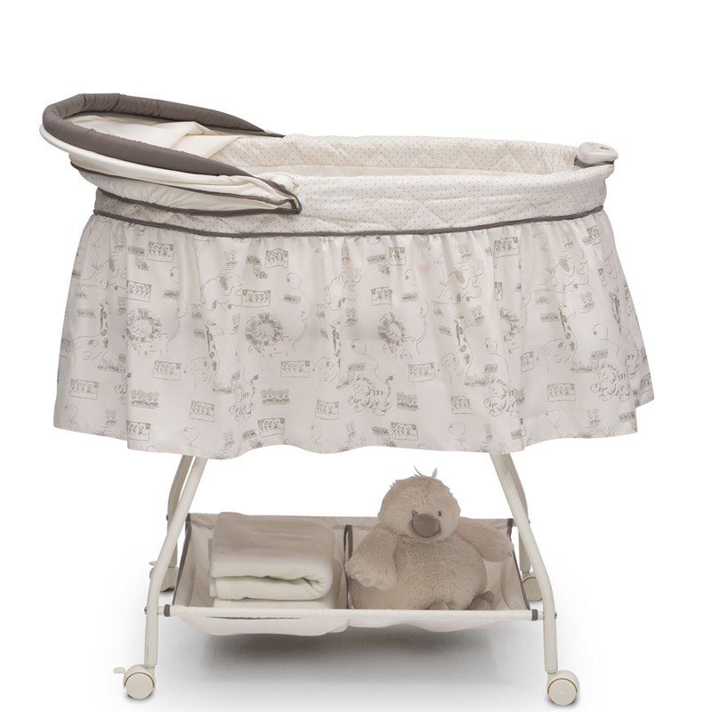 Delta Children Playtime Jungle Plastic Deluxe Sweet Beginnings Bassinet in  Beige