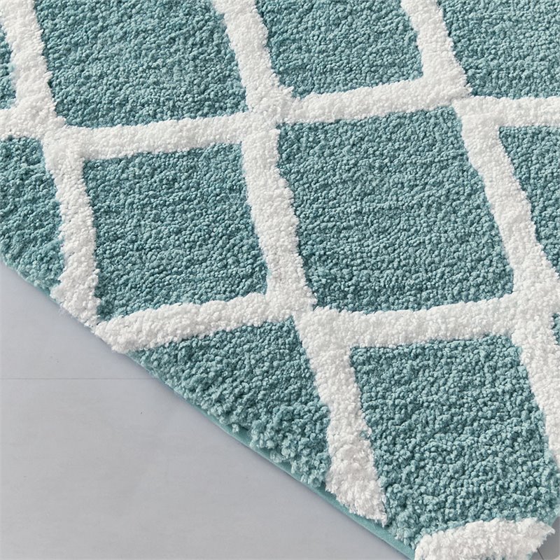 Madison Park Bittman Polyester Reversible Tufted Microfiber Rug in Aqua Blue