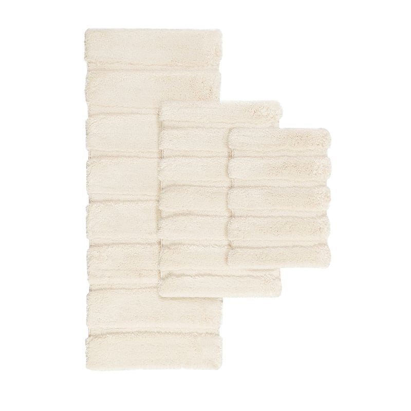 Madison Park Tufted Pearl Channel Rug in Wheat