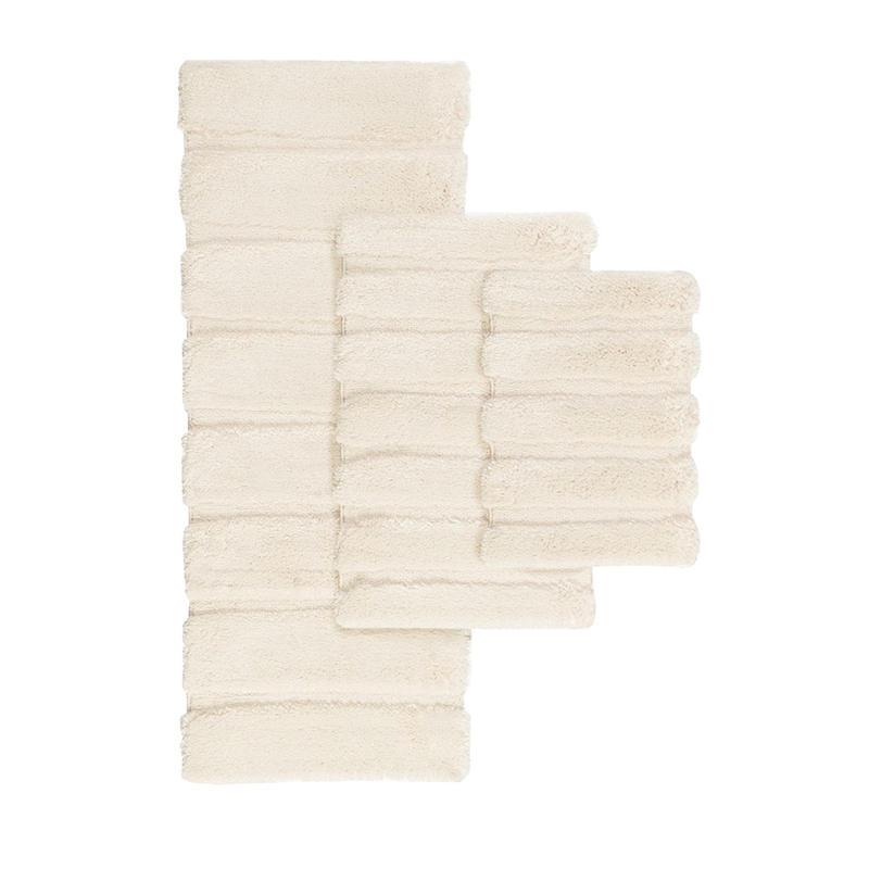 Madison Park Tufted Pearl Channel Rug in Wheat