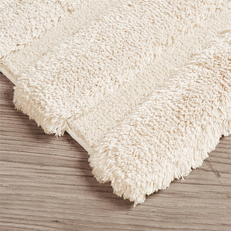 Madison Park Tufted Pearl Channel Rug in Wheat
