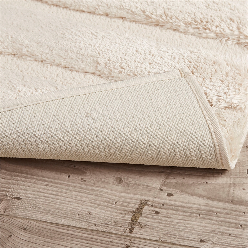 Madison Park Tufted Pearl Channel Rug in Wheat