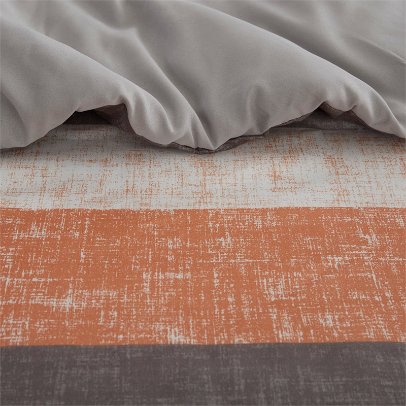 Olliix Madison Park Essentials Jaxon Cal King Comforter Set in Coral/Grey