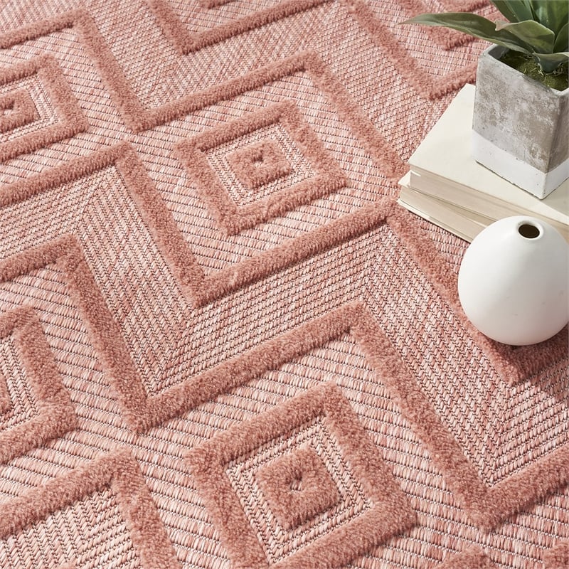 Nourison Versatile 4' x 6' Indoor/Outdoor Rug in Coral/Orange