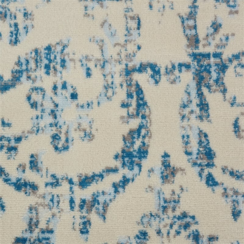 Nourison Jubilant 7' x 10' Ivory/Blue Vintage Indoor Rug Polypropylene