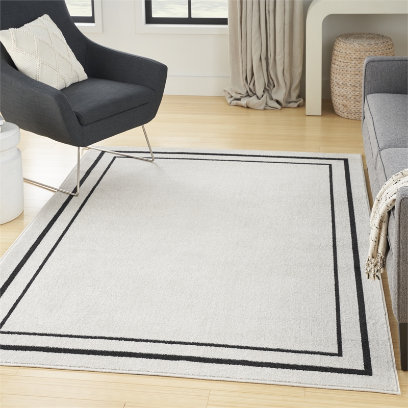 Nourison Essentials 4' x 6' Ivory Black Fabric Contemporary Area Rug (4' x 6')