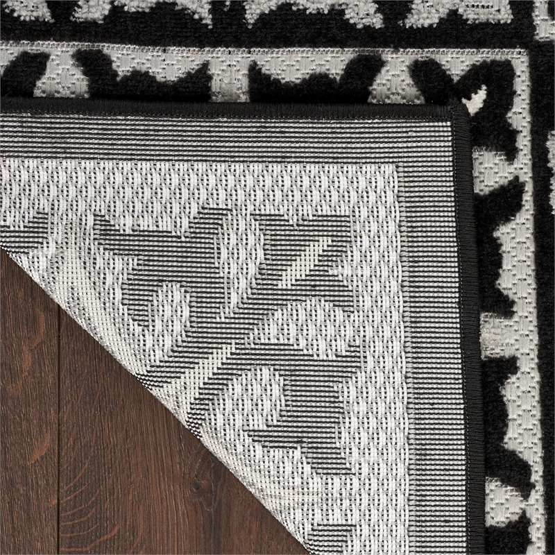 nourison aloha  84x120&quot modern fabric rug in black white finish